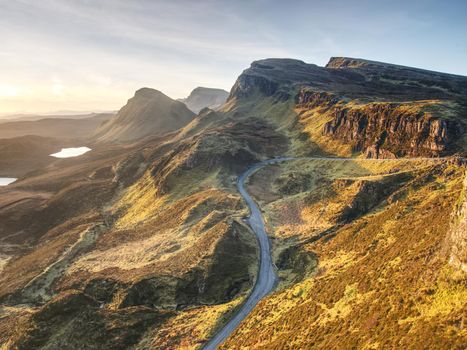 Empty Curvy Road in Scottish Highlands. Northwest Part of Quiraing Hill,  on the Isle of Skye in Scotland