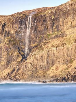 Stunning view of the waterfall of Talisker  on the Isle of Skye in Scotland