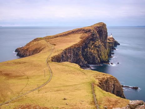 Sunrise over the Neist Point Lighthouse. Popular photographers location on the Isle of Skye in Scotland