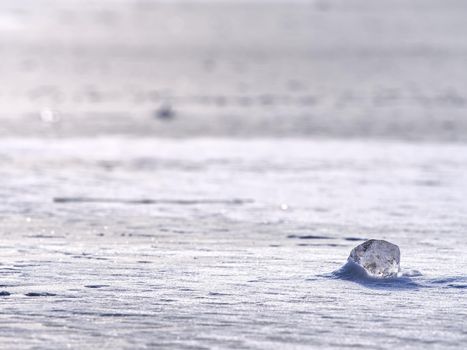 Ice in polar sun reflection. Frozen icy surface in cold winter