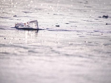 Ice floe and frozen landscape background. Winter view,  frost gound under thick ice.