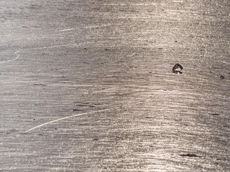 Shards of cracked ice jut out on the frozen lake. The light phenomenon occurs around a very specific time of year