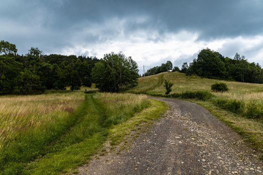 Long mountain trail in Walbrzych Mountains at cloudy day