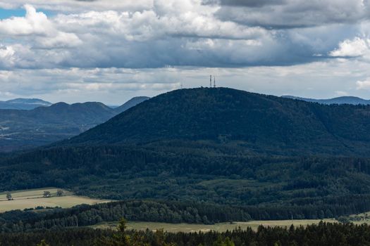 Beautiful panorama of mountains seen from top of observation tower on Trojgarb mountain