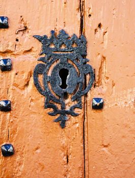 old door lock, aged wooden door, home security, vintage