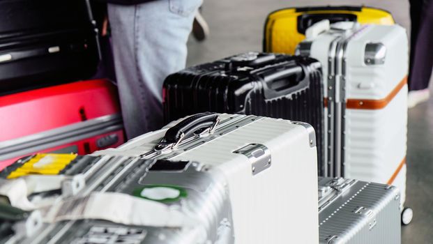 Pile of bag suitcases at airport terminal