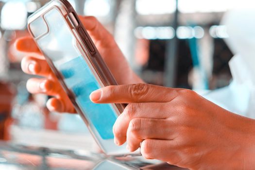 close up image of Teenage girl text messaging on her phone