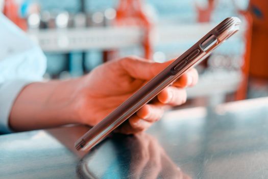 close up image of Teenage girl text messaging on her phone