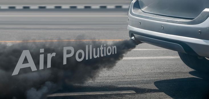 air pollution crisis in city from diesel vehicle exhaust pipe on road