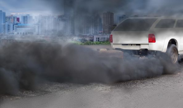 air pollution crisis in city from diesel vehicle exhaust pipe on road