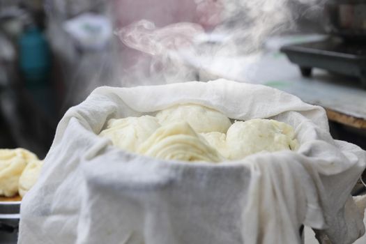 Chinese steamed buns stuffed or baozi in Dali market ,Yunnan China.