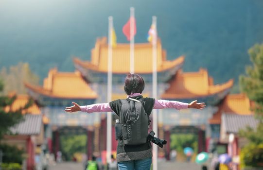 Solo travel female tourist at Chongsheng Temple in Dali old town,Yunnan ,China