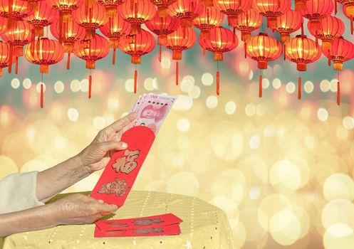 Red envelope chinese new year or hong bao , text on envelope meaning good luck