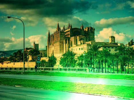 Cathedral of Palma de Majorca at cloudy evening . Light leak.  Abstract.