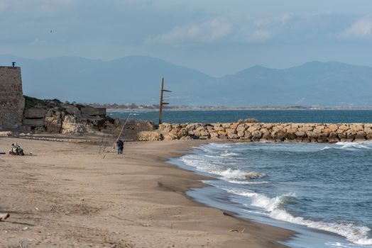Platja de Les Muscleres in La Escala behind the ruins of Empuries, in the Province of Giron, Catalonia, Spain.