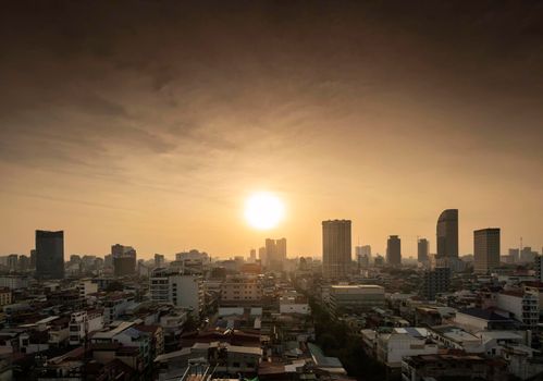 urban view of central phnom penh city skyline in cambodia at sunset