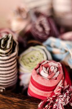 mixed traditional krama cotton scarf souvenirs detail on display at shop in angkor wat in cambodia