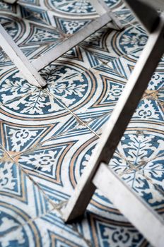 traditional design old rustic floor tiles detail in seville andalucia cafe