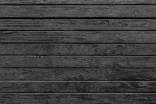 Horizontal black wood background. Old dark wooden background with black wood texture.