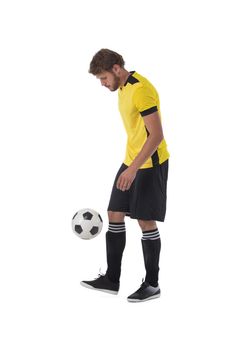 Soccer player is kicking ball isolated on white background