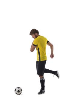 Soccer player is kicking ball isolated on white background