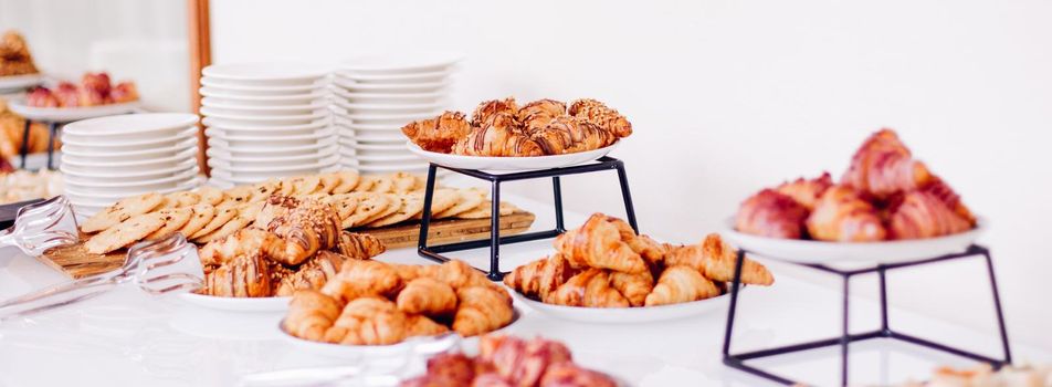 Pastry, cookies and croissants, sweet desserts served at charity event - food, drinks and menu concept as holiday background banner for luxury brand design