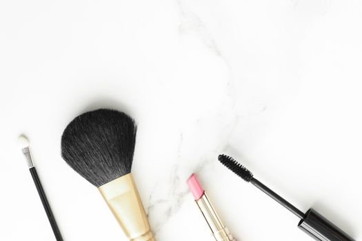 Make-up and cosmetics products on marble, flatlay background - modern feminine lifestyle, beauty blog and fashion inspiration concept