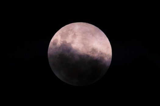 Photograph of a total lunar eclipse from The Blue Mountains in New South Wales on the east coast of Australia