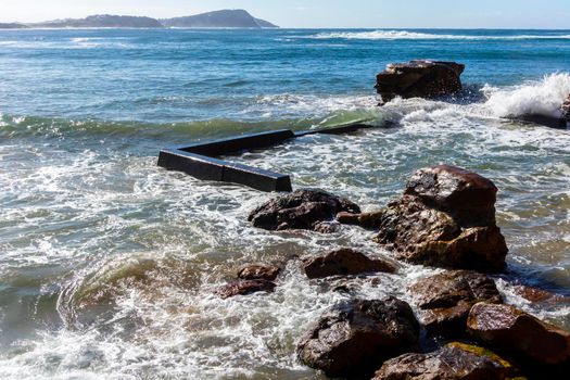 Photograph of the Rock Pool in the Pacific Ocean at Terrigal Beach at sunset on the Central Coast in New South Wales in Australia