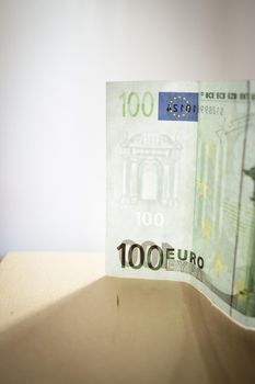 100 euros in official banknotes. No people