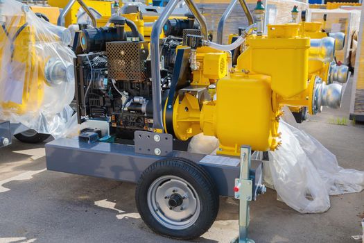 Mobile diesel compressor on wheels for supplying pneumatic air to devices.