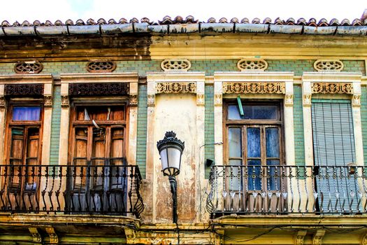 Colorful facades of old buildings in The Cabanyal neighborhood in Valencia, Spain