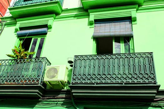 Colorful facades of old buildings in The Cabanyal neighborhood in Valencia, Spain