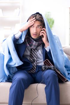 Employee suffering from flue playing computer game at home