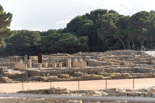 Ruins of Ampuries, La Escala behind the ruins of Empuries, in the Province of Giron, Catalonia, Spain.