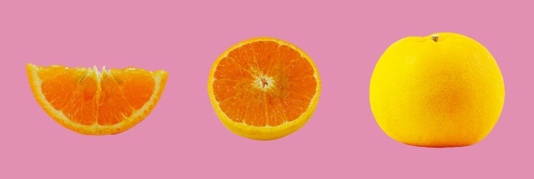 Orange fruit and orange halves
 Isolated on pink background Natural refreshing fruit concept containing Vitamin C.