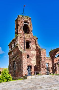 A destroyed brick building on the territory of the Oreshek fortress, red brick ruins