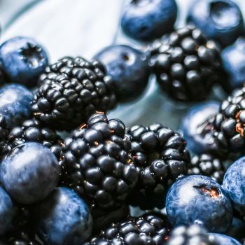 Blueberries and blackberries as fruit background, healthy food and berry juice, vegan snack and diet nutrition.