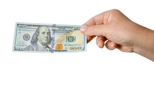 Female hand holds a banknote of 100 American dollars in cash, isolated on white background. 100 US dollars banknote
