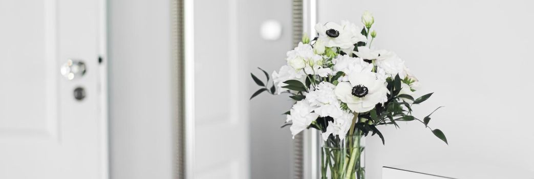 Bouquet of flowers in vase and home decor details, luxury interior design closeup