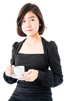 Young woman sittng holding coffee cup on white background