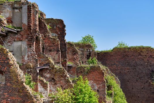 A destroyed brick building on the territory of the Oreshek fortress, red brick ruins