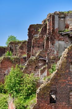 A destroyed brick building on the territory of the Oreshek fortress, red brick ruins