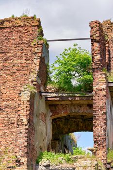 A destroyed brick building on the territory of the Oreshek fortress, red brick ruins