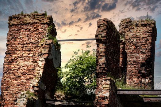 A destroyed brick building on the territory of the Oreshek fortress, red brick ruins