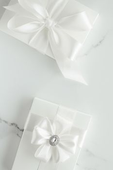 Romantic celebration, lifestyle and holiday present concept - Luxury wedding gifts on marble