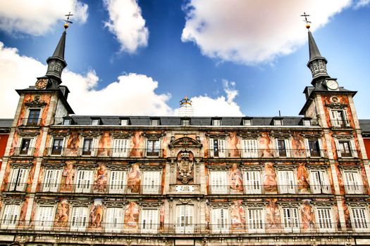 Beautiful main square in Madrid called Plaza Mayor with its majestic facades in a sunny day of Spring