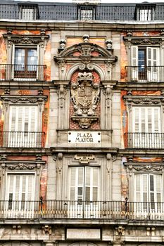 Beautiful main square in Madrid called Plaza Mayor with its majestic facades in a sunny day of Spring