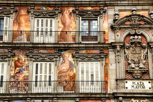 Beautiful main square in Madrid called Plaza Mayor with its majestic facades in a sunny day of Spring