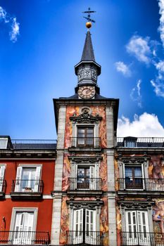 Beautiful main square in Madrid called Plaza Mayor with its majestic facades in a sunny day of Spring